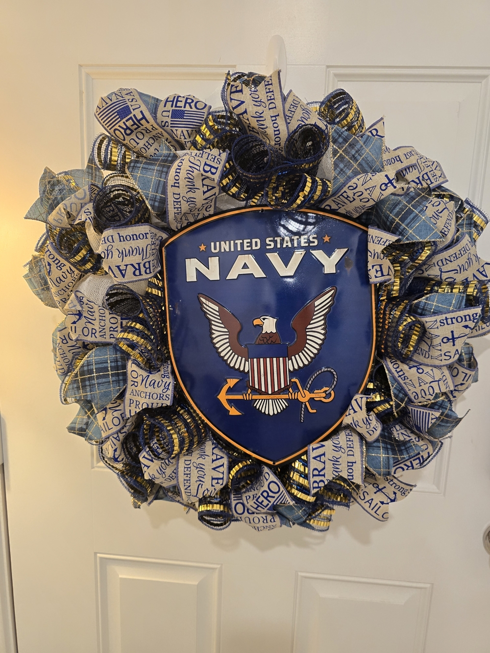 United States Navy Blue & White Patriotic Wreath

measure about 24" x 24" x 7"